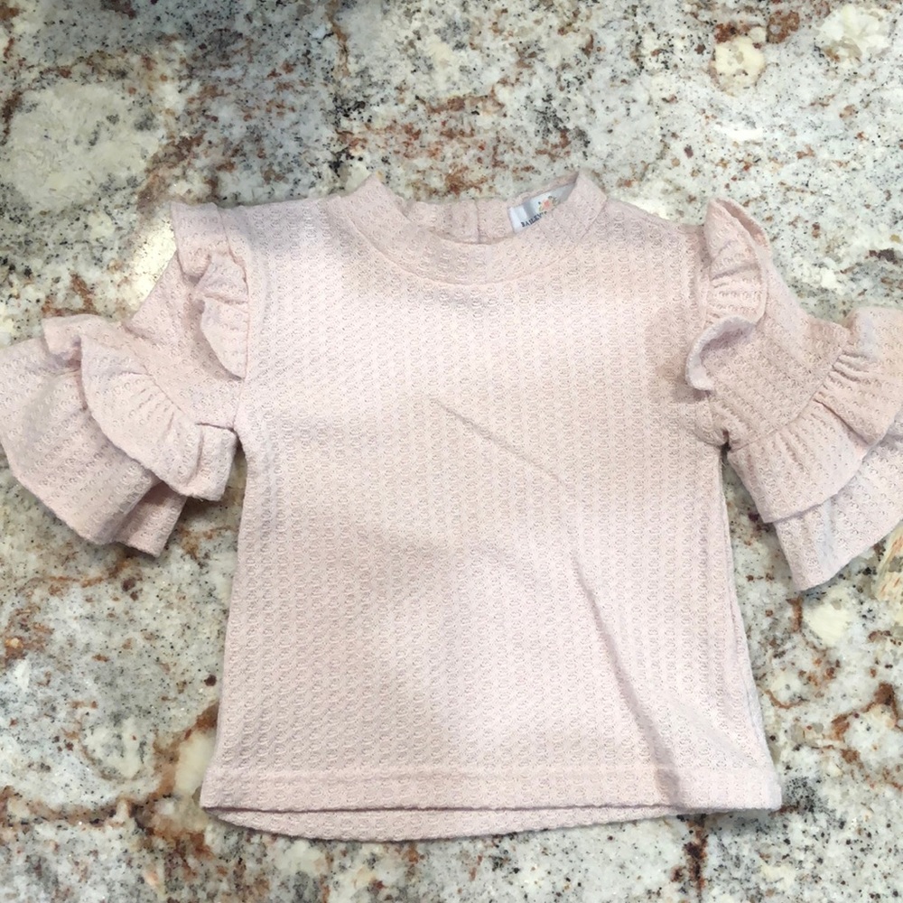 Bailey’s Blossoms ruffle shirt size 6-9 months.
